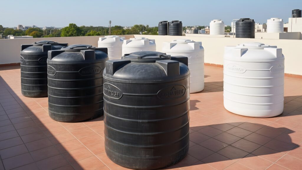 Modern rooftop with LLDPE and HDPE water storage tanks under sunlight. Best water storage tank